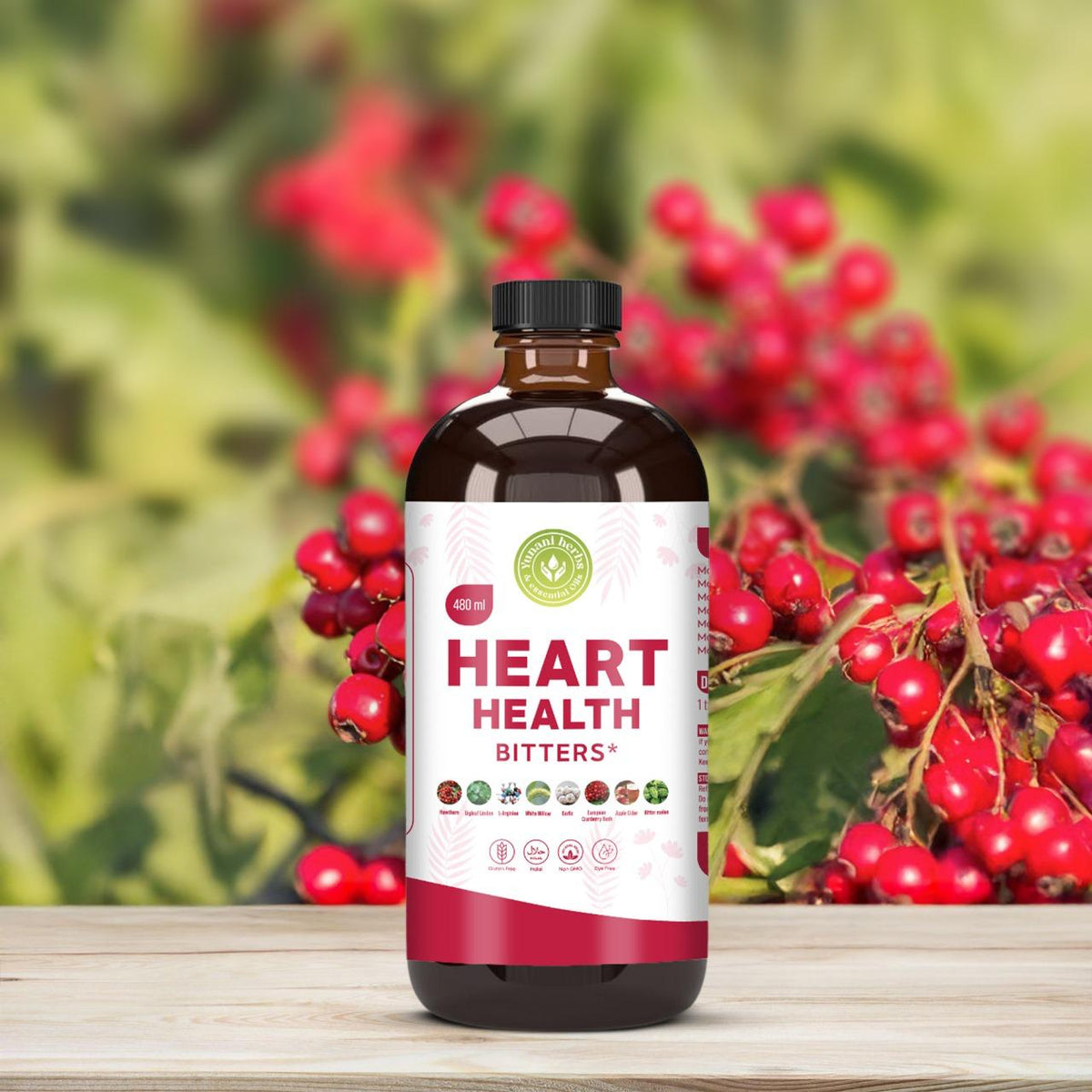 Heart Health Bitters 480ml bottle with hawthorn berries background